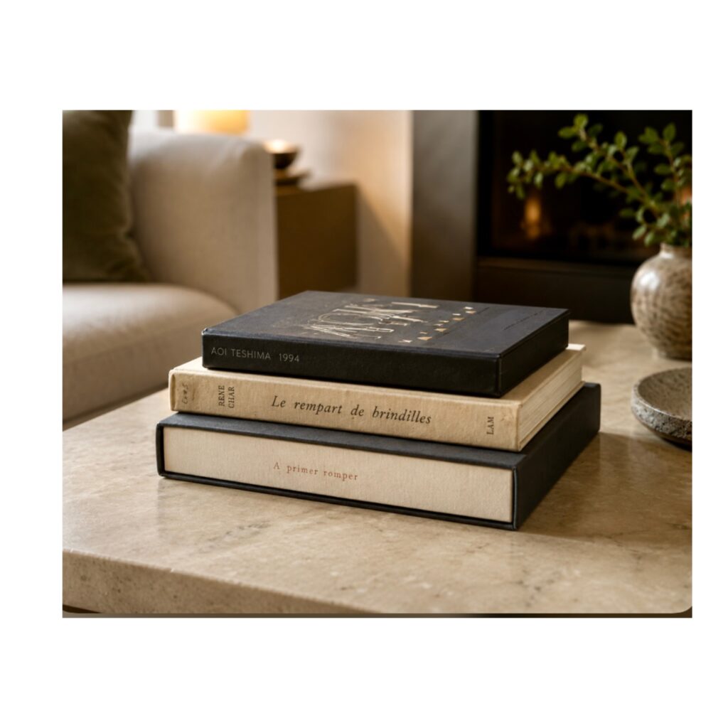 Louis Broder books on a coffee table
